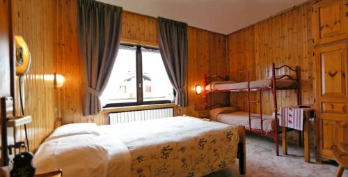 Postel nebo postele na pokoji v ubytování Hotel Federia