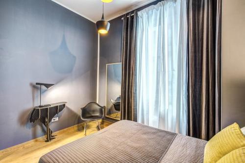 En eller flere senger på et rom på Cinque Terre Stylish Apartments