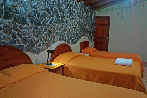Cama o camas de una habitación en Mindo Real