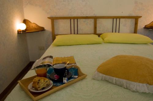 Un ou plusieurs lits dans un hébergement de l'établissement Agriturismo La Locandiera