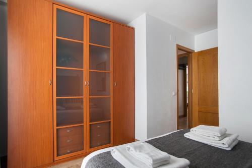 Postel nebo postele na pokoji v ubytování Tendency Apartments Fira
