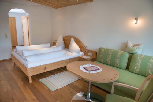 Säng eller sängar i ett rum på Hotel Hertehof