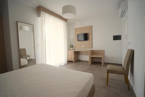 TV o dispositivi per l'intrattenimento presso Rooms Angedras