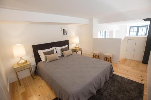 Postel nebo postele na pokoji v ubytování FLH Santa Catarina Modern Place