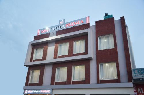 a building with a sign on top of it at Mint Hotel Premia Chandigarh, Zirakpur in Chandīgarh