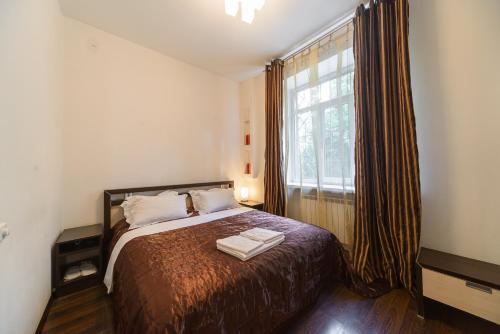 Кровать или кровати в номере Partner Guest House Baseina
