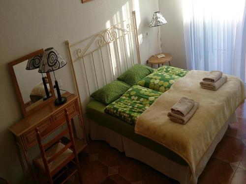 Rúm í herbergi á Apartament Tina "Ozonizado"