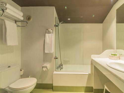 Koupelna v ubytování Sport Hotel