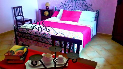 A bed or beds in a room at Agriturismo Vemi