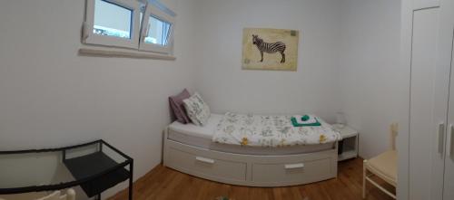 Кровать или кровати в номере Apartment Homey