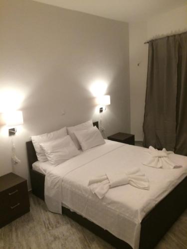Ένα ή περισσότερα κρεβάτια σε δωμάτιο στο Melita Apartment Seaside