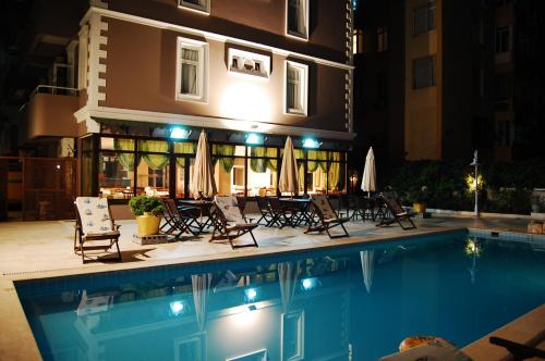 Bazén v ubytování Triana Hotel nebo v jeho okolí