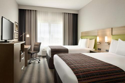 Imagen de la galería de Country Inn & Suites by Radisson, Indianola, IA, en Indianola