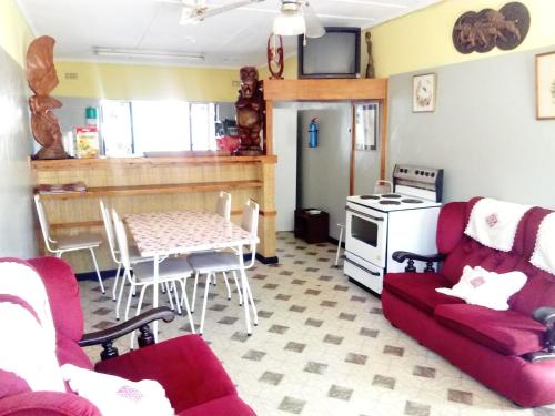 Zona d'estar a Pennywise Cottages