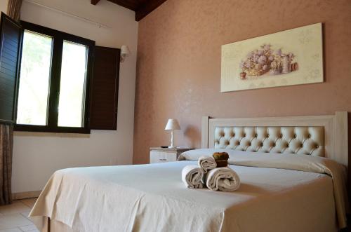 Ліжко або ліжка в номері B&b Paduli Piani Gallipoli
