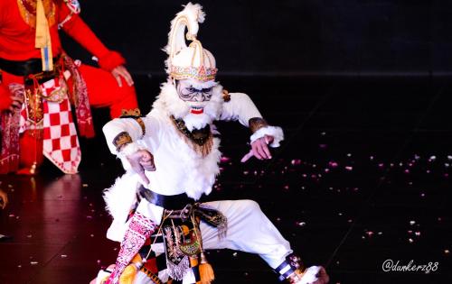 a man dressed as a clown dancing on a stage at Tasneem Hotel Malioboro Yogyakarta in Yogyakarta