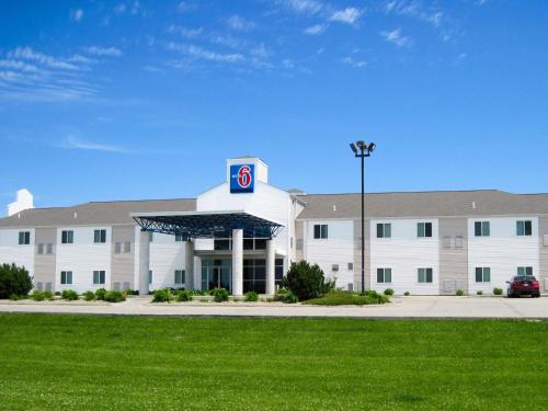 a large white building with the number six on it at Motel 6-Avoca, IA in Avoca
