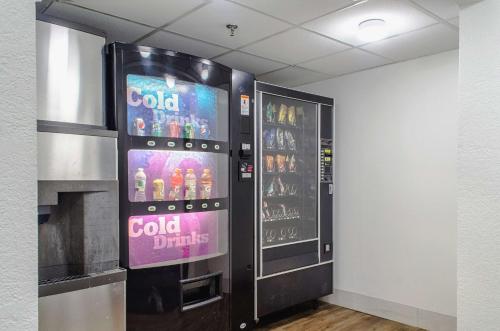 a cold drink vending machine in a room at Motel 6-Brockton, MA in Brockton