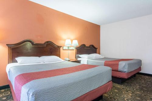 Postel nebo postele na pokoji v ubytování Motel 6-Hope, AR