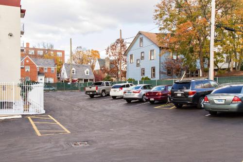 a parking lot with cars parked in it at Motel 6-Washington, DC in Washington, D.C.