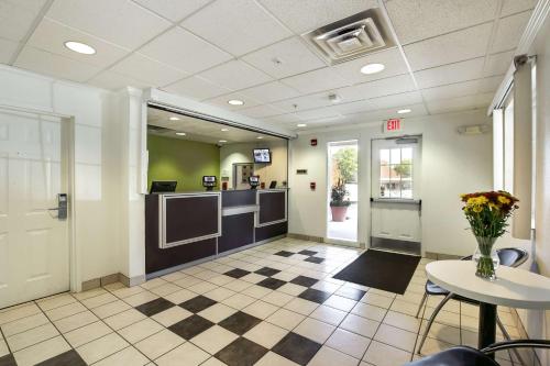 a lobby with a waiting area in a hospital at Studio 6-East Brunswick, NJ - NYC Area in East Brunswick