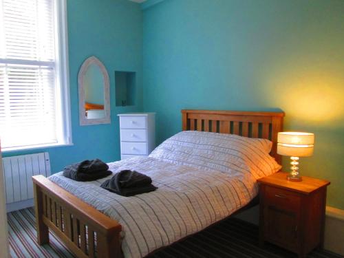 Voodi või voodid majutusasutuse The Old Kitchens toas