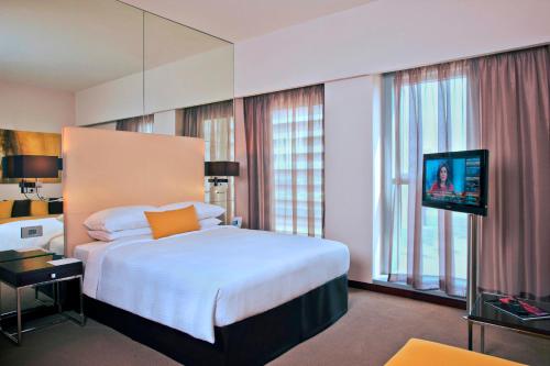  Centro Capital Centre By Rotana -  Room  picture :    Shower    Safety deposit box    TV                            