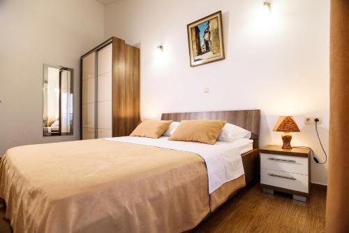 Postel nebo postele na pokoji v ubytování Villa Dusanka