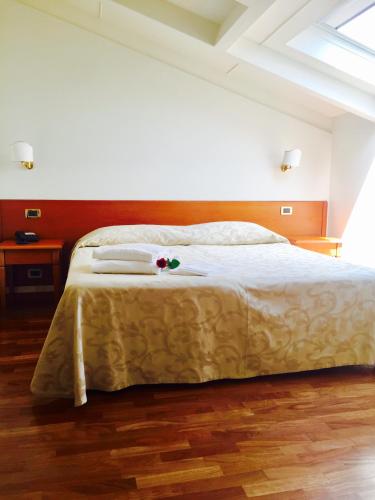 Cama o camas de una habitación en Hotel Claila