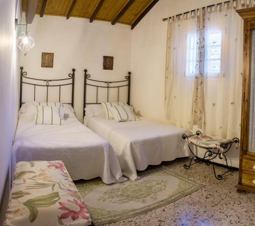 Postel nebo postele na pokoji v ubytování La Casa Del Campo