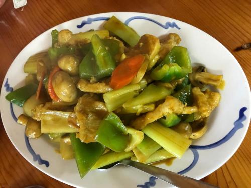 a plate of food with vegetables on a table at Glacier View Inn in Haines Junction