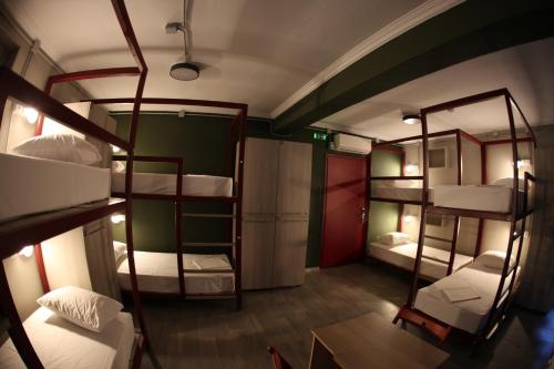 a room with four bunk beds in it at Stay Hybrid Youth Hostel in Thessaloniki