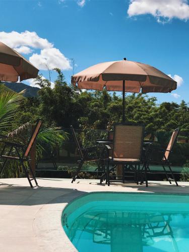 La alberca dentro o cerca de Hotel Pousada Bambuzal
