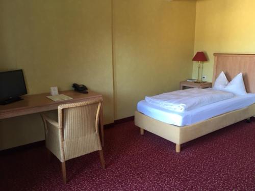 Postel nebo postele na pokoji v ubytování Hotel Hannover