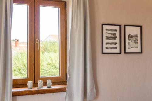 a bathroom with a window and a window sill at Villa Ingrid in Poreč