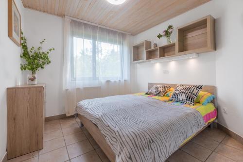 Postel nebo postele na pokoji v ubytování Apartment - Speleo Camp