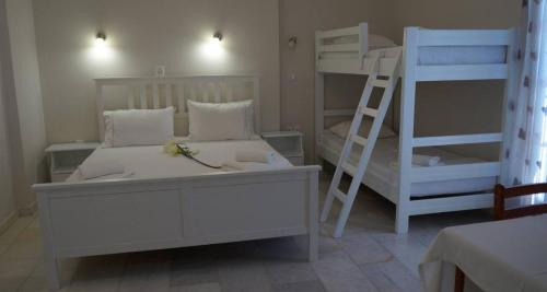 Ένα ή περισσότερα κρεβάτια σε δωμάτιο στο Hotel Sagterra 