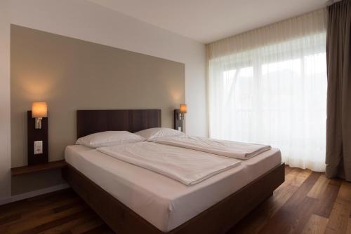 Cama o camas de una habitación en Apparthotel Calma
