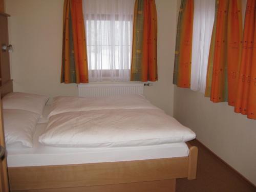 Posteľ alebo postele v izbe v ubytovaní Ferienwohnung Ketterer