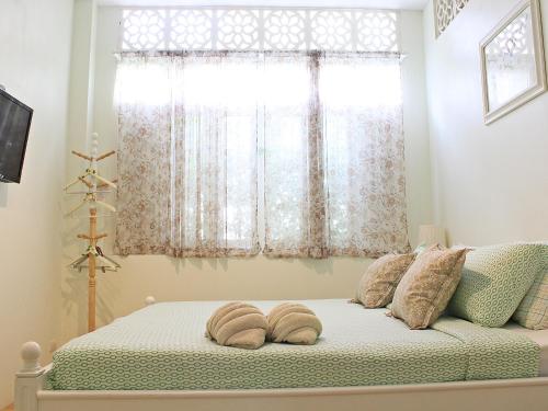 Katil atau katil-katil dalam bilik di Lada House