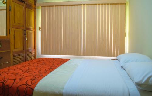 Katil atau katil-katil dalam bilik di Hotel Fontana