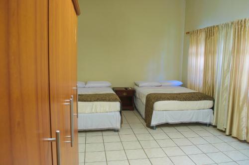 Katil atau katil-katil dalam bilik di Hotel Fontana
