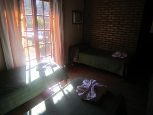 Katil atau katil-katil dalam bilik di Hotel Altos del Rincon