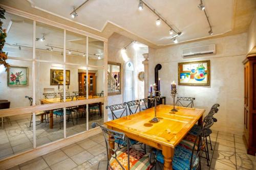 a dining room with a wooden table and chairs at VILLA MARJAN - 3 bdr, 3 bath, parking in Split