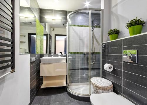 Kylpyhuone majoituspaikassa Mieszkanie Classa - ACCO RENT