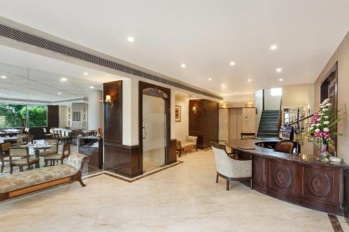 Χώρος καθιστικού στο La Place Sarovar Portico