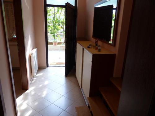 Kuchyň nebo kuchyňský kout v ubytování Apartment Ana