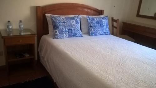Postel nebo postele na pokoji v ubytování Residencial Idalio