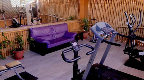 Het fitnesscentrum en/of fitnessfaciliteiten van Bungalows Los Almendros - Gay Exclusive