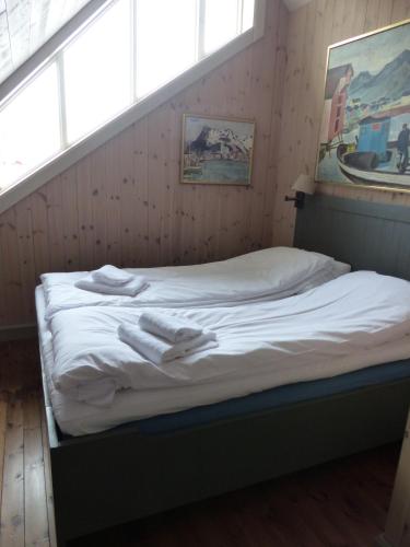 Reine Rorbuer - by Classic Norway Hotelsにあるベッド